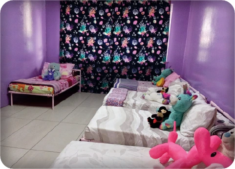 A colourful bedroom at the Home