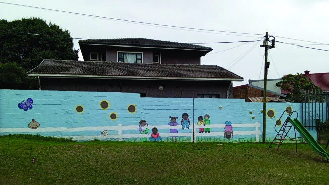 Garden and mural outside St Thomas Home